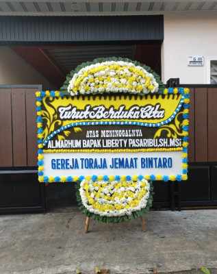 Papan Bunga Duka di Apitalawu